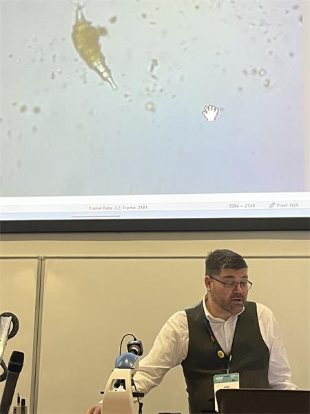 Dr Andy discussing a rotifer (wheel animal)
